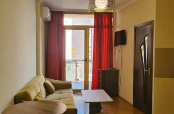Rent a day with a flat in front of a grand mole