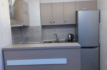 An apartment is for rent in a good location near Zva
