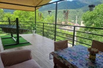 Rent a balcony apartment with a panoramic view of a mountain
